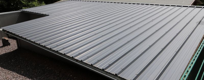 Metal Roof Installation Vs. Asphalt Roofing: Key Differences Explained